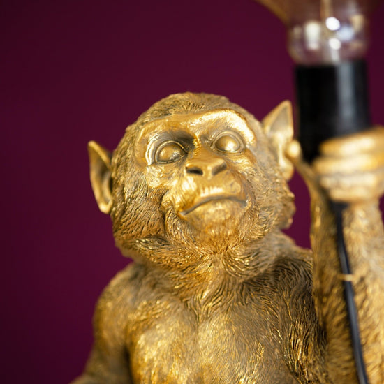 Tischleuchte Abu, sitzend, gold