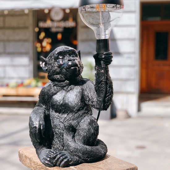 Tischleuchte Abu, sitzend, schwarz