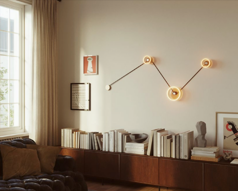Ghost Line Donut in zwei Grössen als Wandleuchten über einem Sideboard