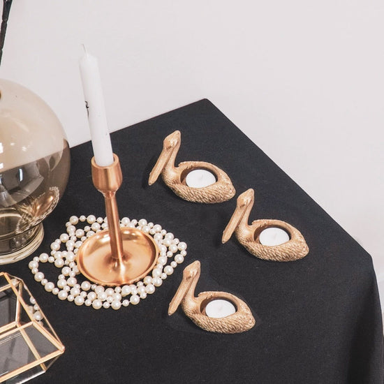 Teelicht / Tischleuchte Pelikan Petros, gold